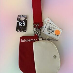 188,NWT Lululemon Athletica Red and Cream Color Dual Pouch Wristlet